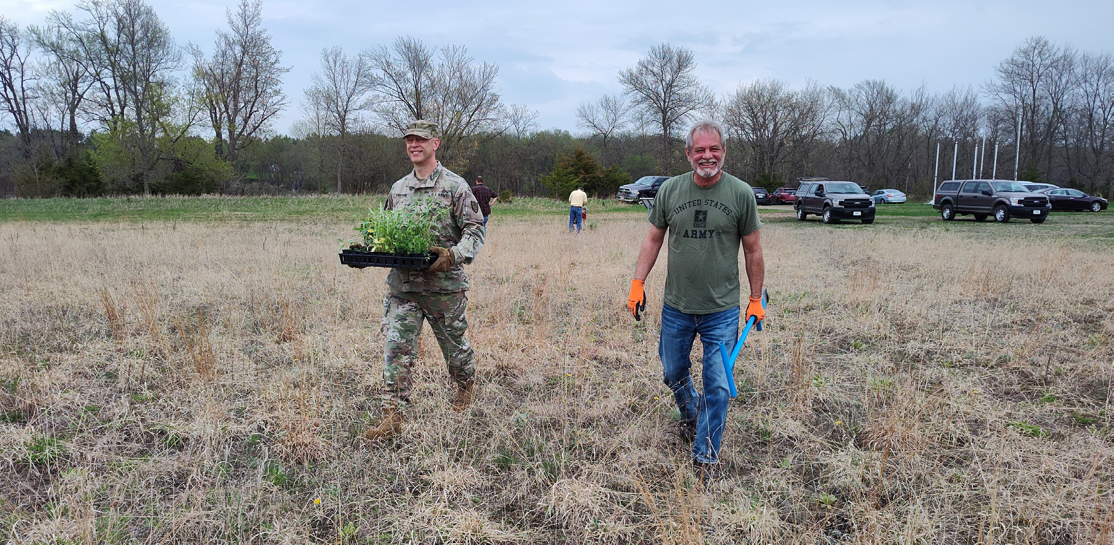 Morrison SWCD staff and Minnesota National Guard officer prepare to plant native plants at Camp Ripley.